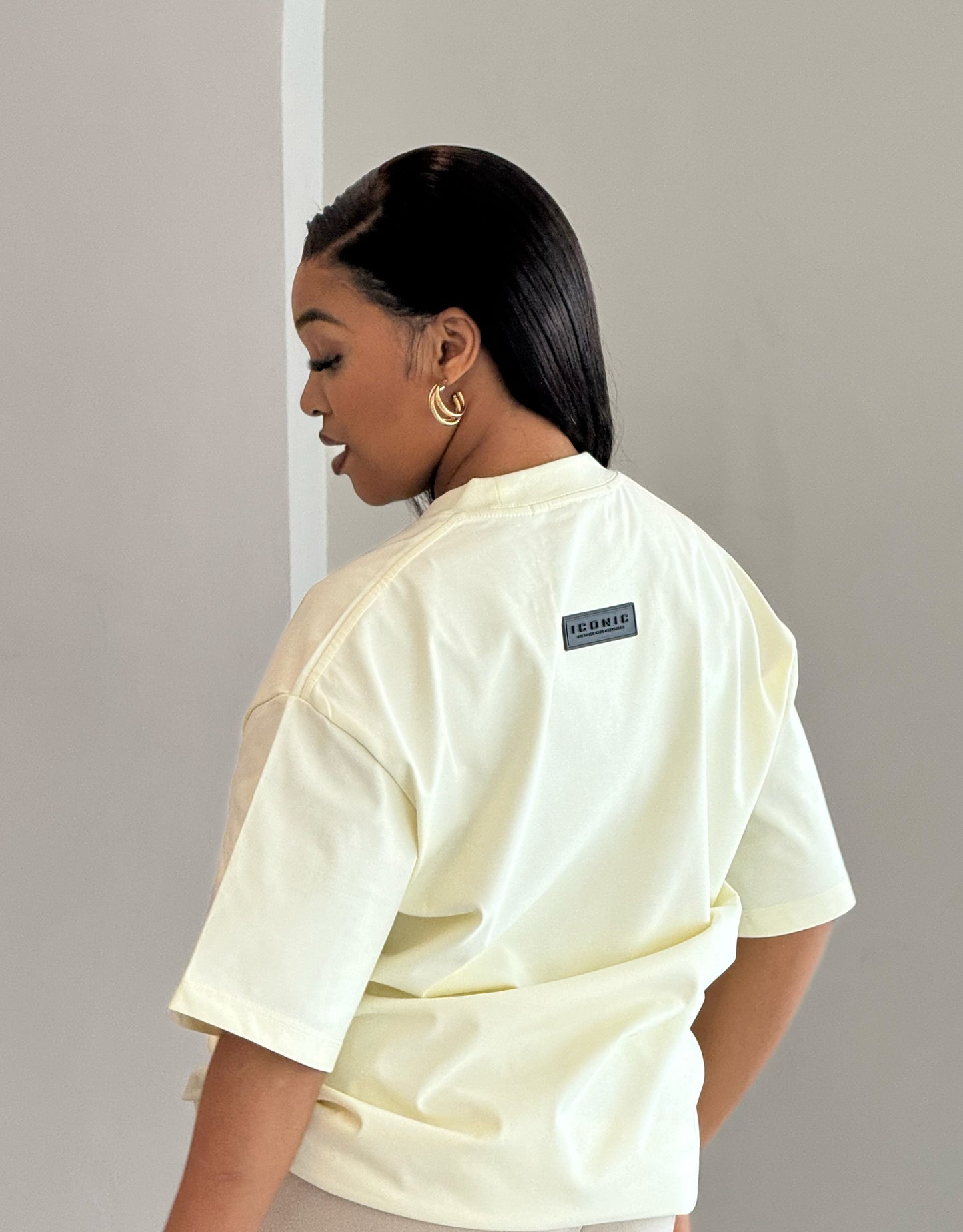 C. Classic Yellow Pocket Size Iconic Logo T-Shirt